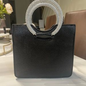 Black wrist bag crystal handles
